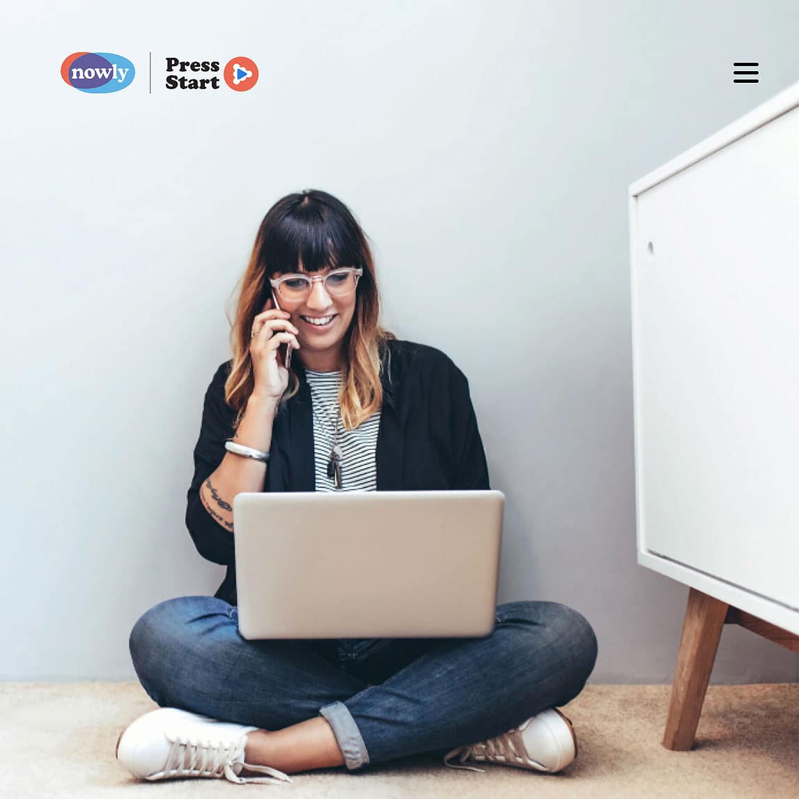 woman sit on floor laptop phone